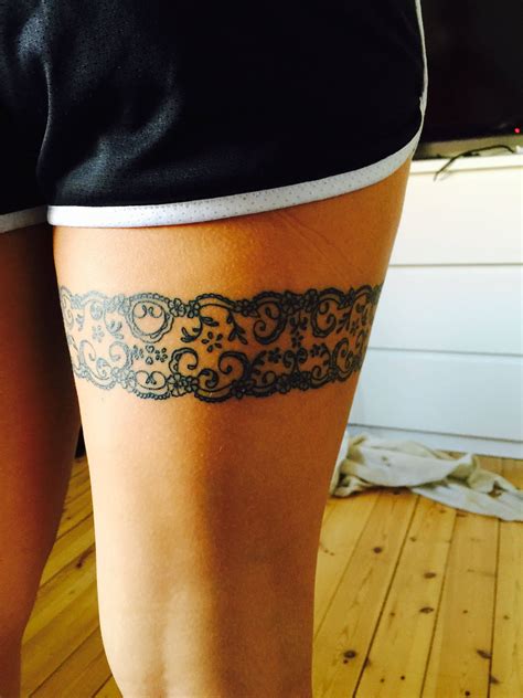 around the thigh tattoos